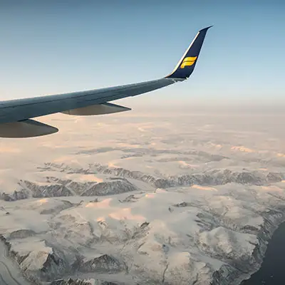 Flight over snowy mountains.