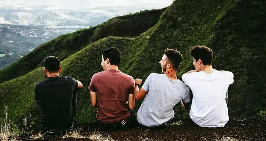 A-group-of-students-sit-on-a-mountain
