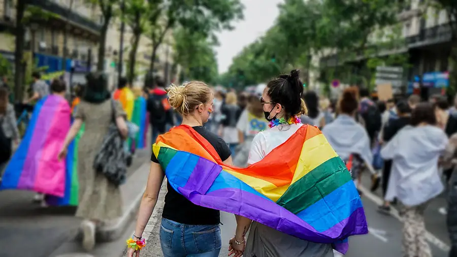 Lesbian couple at PRIDE parade in Philadelphia's Gayborhood.