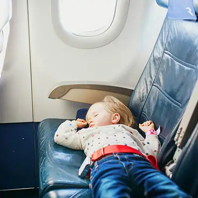 Sleeping toddler on airplane.