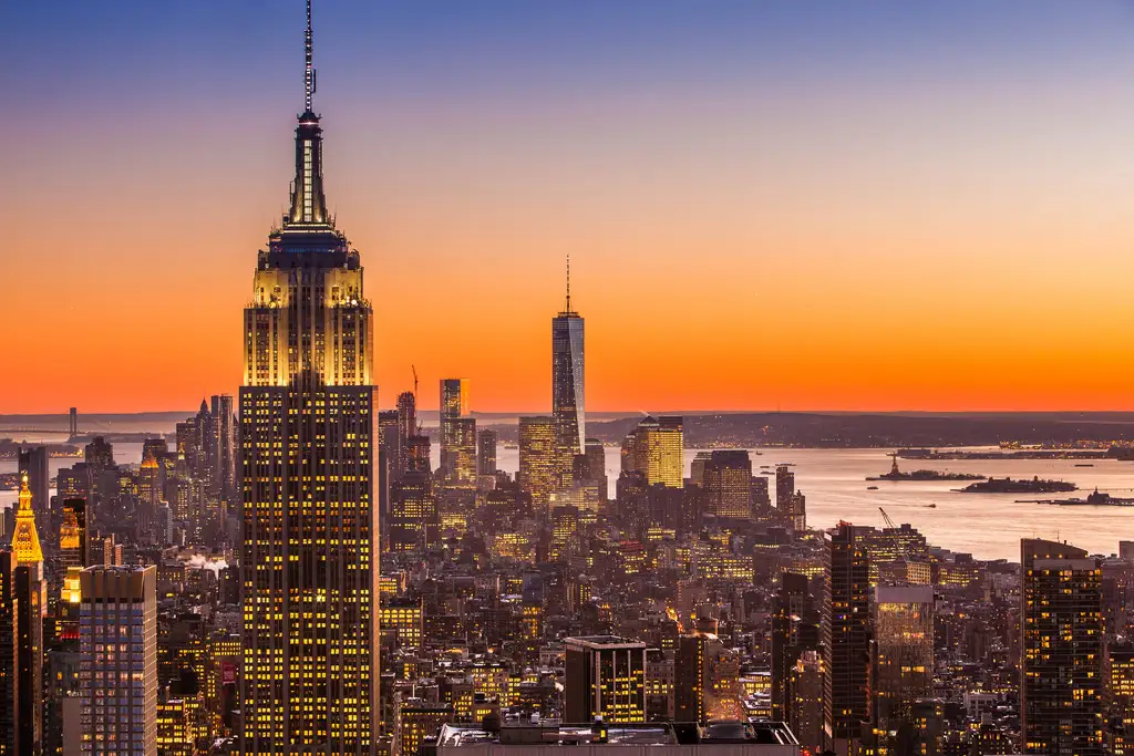 Empire state building and New York skyline at sunset