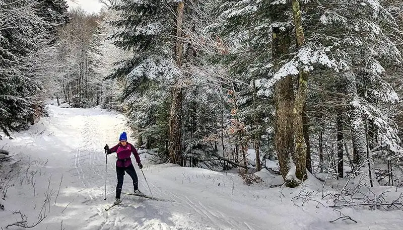 A-winter-traveler-skis-down-a-mountain